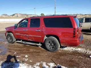 2014 Chevrolet Suburban LTZ with VIN 1GNSCKE08ER168239, listed as a Copart auction lot 42143915 with 137,902 mi miles and Salvage title. Bid and sale history available at DreamBid. Image 2.