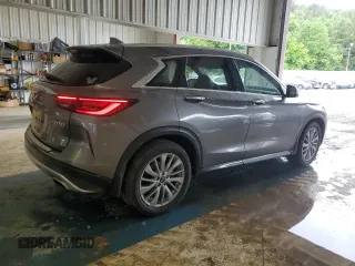 2023 Infiniti QX50 Luxe z VIN 3PCAJ5BA7PF103254, wystawiony jako Copart lot #54495665 z przebiegiem 51 514 mil mil oraz Szkoda całkowita • Salvage title. Historia ofert i sprzedaży dostępna na DreamBid. Obrazek 3.