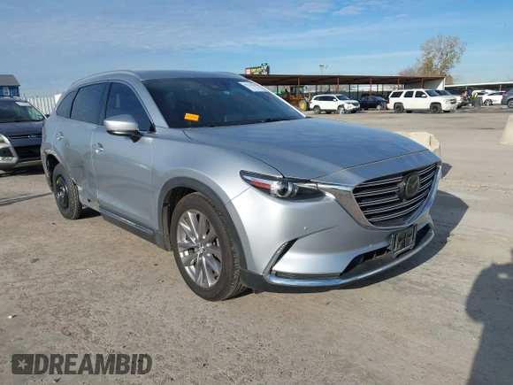 2020 Mazda CX-9 Grand Touring z VIN JM3TCADY7L0416696, wystawiony jako IAAI lot #41310183 z przebiegiem 105 754 mil mil oraz . Historia ofert i sprzedaży dostępna na DreamBid. Obrazek 1.