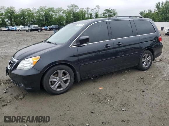2008 Honda Odyssey Touring z VIN 5FNRL38968B014503, wystawiony jako Copart lot #56817625 z przebiegiem Nie podano mil oraz Szkoda całkowita • Salvage title. Historia ofert i sprzedaży dostępna na DreamBid. Obrazek 1.