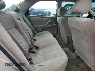2000 Toyota Camry CE with VIN 4T1BG22K1YU621861, listed as a Copart auction lot 51611275 with 153,153 mi miles and Salvage Title. Bid and sale history available at carsss.com. Image 9.