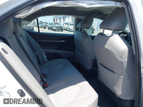2023 Toyota Camry SE with VIN 4T1G11AK0PU736081, listed as a IAAI auction lot 42090419 with 32,303 mi miles and . Bid and sale history available at DreamBid. Image 8.