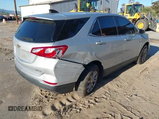 2020 Chevrolet Equinox LT with VIN 2GNAXUEV7L6111580, listed as a IAAI auction lot 41830060 with 96,968 mi miles and . Bid and sale history available at DreamBid. Image 4.