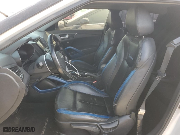 2014 Hyundai Veloster Turbo with VIN KMHTC6AE0EU192680, listed as a Copart auction lot 54486575 with 129,949 mi miles and Clean Title. Bid and sale history available at carsss.com. Image 7.