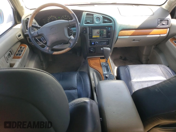 2001 Infiniti QX4 Luxury z VIN JNRDR09Y21W212879, wystawiony jako Copart lot #57227755 z przebiegiem 164 465 mil mil oraz Szkoda całkowita • Salvage title. Historia ofert i sprzedaży dostępna na DreamBid. Obrazek 8.