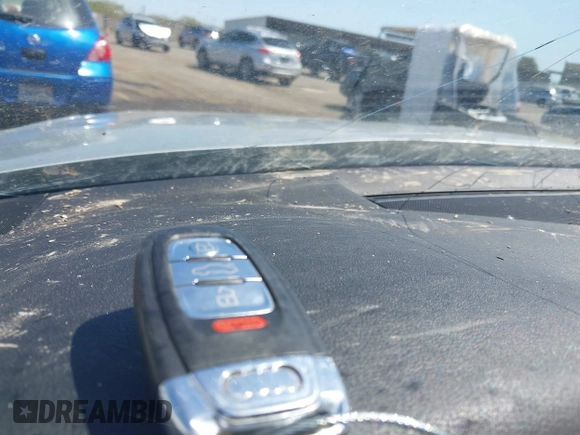 2013 Audi A5 Premium Plus z VIN WAULFAFR4DA000796, wystawiony jako IAAI lot #41970171 z przebiegiem Nie podano mil oraz . Historia ofert i sprzedaży dostępna na DreamBid. Obrazek 11.