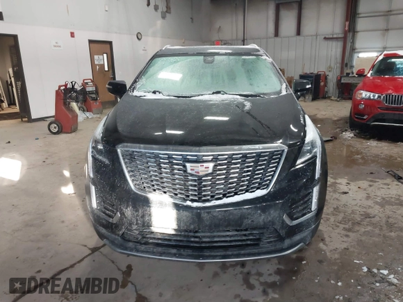 2021 Cadillac XT5 FWD Premium Luxury with VIN 1GYKNCRS3MZ198651, listed as a IAAI auction lot 41607734 with 49,275 mi miles. Bid and sale history available at carsss.com. Image 12.
