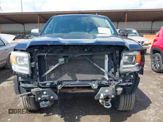 2014 GMC Sierra 1500 Denali z VIN 3GTU2WEC6EG401458, wystawiony jako IAAI lot #41935704 z przebiegiem 149 136 mil mil oraz . Historia ofert i sprzedaży dostępna na DreamBid. Obrazek 13.