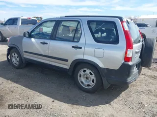 2006 Honda CR-V LX with VIN JHLRD785X6C057434, listed as a IAAI auction lot 41881971 with 210,658 mi miles and . Bid and sale history available at carsss.com. Image 3.