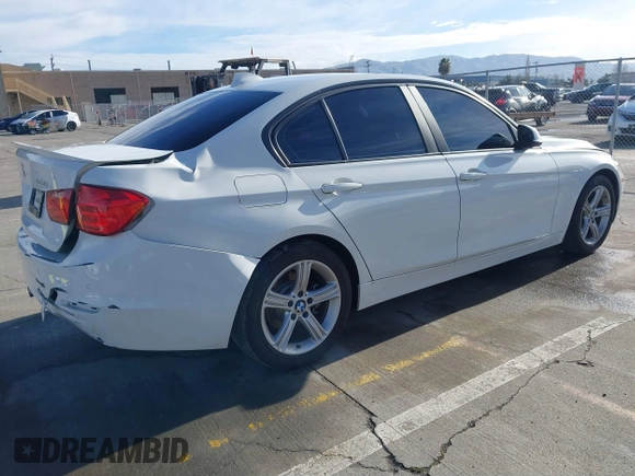 2015 BMW 3 Series 328i with VIN WBA3C1C52FK119339, listed as a IAAI auction lot 41549876 with 148,347 mi miles and . Bid and sale history available at carsss.com. Image 4.