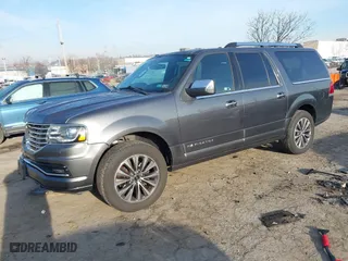 2015 Lincoln Navigator L with VIN 5LMJJ3JT3FEJ13389, listed as a IAAI auction lot 41205754 with 117,883 mi miles. Bid and sale history available at carsss.com. Image 16.