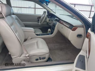 1998 Cadillac Eldorado z VIN 1G6EL12Y2WU603722, wystawiony jako IAAI lot #41879733 z przebiegiem 81 780 mil mil oraz . Historia ofert i sprzedaży dostępna na DreamBid. Obrazek 5.