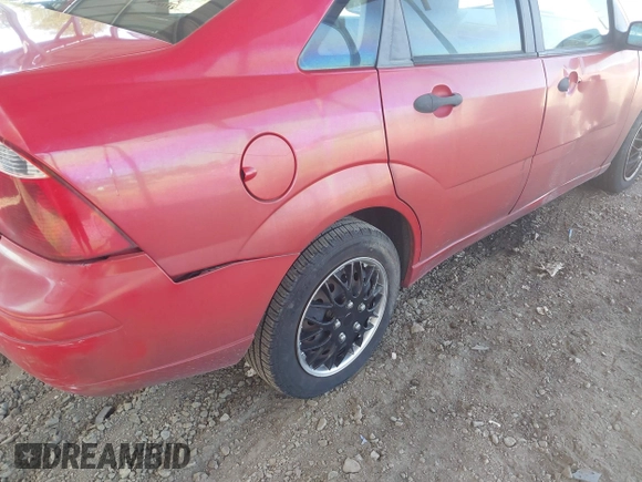 2007 Ford Focus S z VIN 1FAFP34N07W363568, wystawiony jako IAAI lot #42557496 z przebiegiem 120 123 mil mil oraz . Historia ofert i sprzedaży dostępna na DreamBid. Obrazek 6.