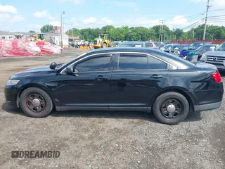 2014 Ford Police Interceptor with VIN 1FAHP2MK0EG170496, listed as a IAAI auction lot 42693683 with 147,921 mi miles and . Bid and sale history available at DreamBid. Image 14.
