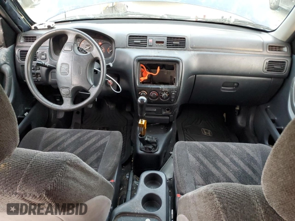 1999 Honda CR-V LX with VIN JHLRD1742XC066975, listed as a Copart auction lot 79447754 with 214,729 mi miles and Salvage Title. Bid and sale history available at carsss.com. Image 8.