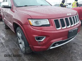 2014 Jeep Grand Cherokee Overland with VIN 1C4RJFCG9EC299235, listed as a IAAI auction lot 41670065 with 108,589 mi miles and . Bid and sale history available at DreamBid. Image 18.