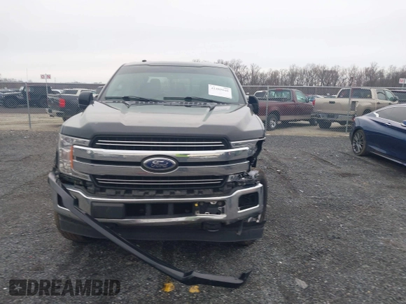 2018 Ford F-150 XL with VIN 1FTEW1E51JFC55334, listed as a IAAI auction lot 41485040 with 122,169 mi miles. Bid and sale history available at carsss.com. Image 12.