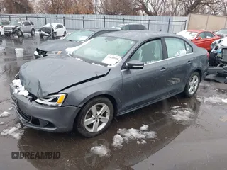 2014 Volkswagen Jetta TDI w/Premium/Nav с VIN 3VWLL7AJ4EM332920, выставлен на аукционе IAAI как лот 41630948 с пробегом 148 754 миль миль и . История ставок и продаж доступна на DreamBid. Изображение 2.