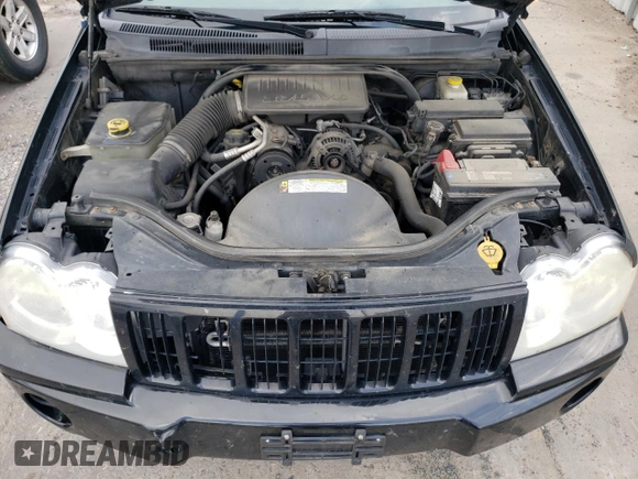 2007 Jeep Grand Cherokee Laredo with VIN 1J8GR48K77C569155, listed as a Copart auction lot 66904414 with 171,064 mi miles and Salvage Title. Bid and sale history available at carsss.com. Image 12.