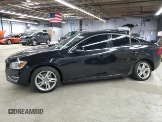 2015 Volvo S60 T5 Drive-E Platinum with VIN YV140MFM7F2348128, listed as a Copart auction lot 52698615 with 88,924 mi miles and Salvage Title. Bid and sale history available at carsss.com. Image 1.