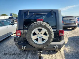2008 Jeep Wrangler Unlimited Sahara with VIN 1J8GA59158L538460, listed as a Copart auction lot 63897295 with 335,852 mi miles and Clean title. Bid and sale history available at DreamBid. Image 6.