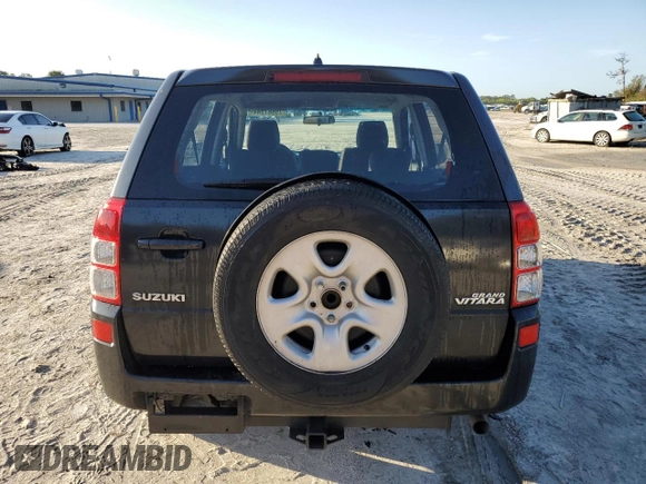 2007 Suzuki Grand Vitara z VIN JS3TE941674200553, wystawiony jako Copart lot #75667344 z przebiegiem 177 312 mil mil oraz Szkoda całkowita • Salvage title. Historia ofert i sprzedaży dostępna na DreamBid. Obrazek 6.
