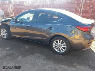 2015 Mazda Mazda3 i Touring with VIN 3MZBM1V71FM169911, listed as a IAAI auction lot 40982452 with 126,885 mi miles. Bid and sale history available at carsss.com. Image 3.