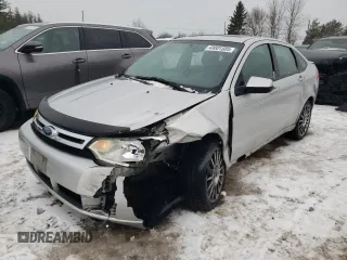 2009 Ford Focus SES with VIN 1FAHP36N19W214689, listed as a Copart auction lot 43001385 with 295,859 mi miles and Salvage Title. Bid and sale history available at carsss.com. Image 1.