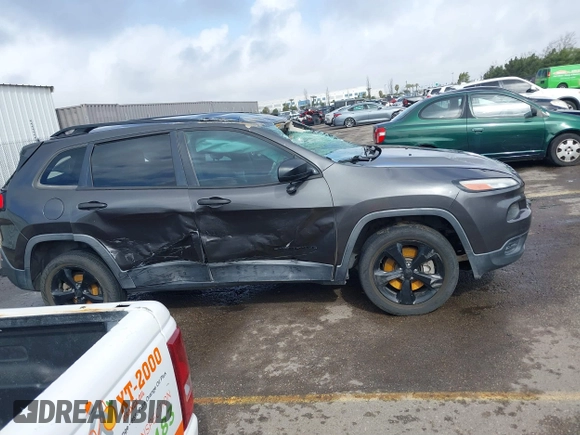 2017 Jeep Cherokee Sport with VIN 1C4PJLAB8HW527354, listed as a IAAI auction lot 41578066 with 124,339 mi miles. Bid and sale history available at carsss.com. Image 13.