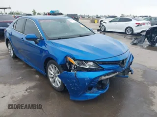 2019 Toyota Camry LE z VIN 4T1B11HK9KU237871, wystawiony jako IAAI lot #41933943 z przebiegiem 93 853 mil mil oraz . Historia ofert i sprzedaży dostępna na DreamBid. Obrazek 1.