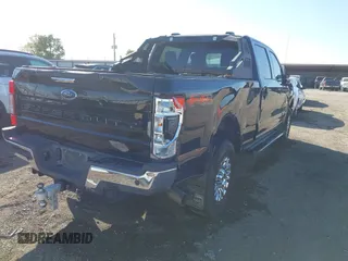 2021 Ford Super Duty F-250 SRW XL with VIN 1FT7W2BT4MEC88324, listed as a IAAI auction lot 40584769 with 163,379 mi miles. Bid and sale history available at carsss.com. Image 4.