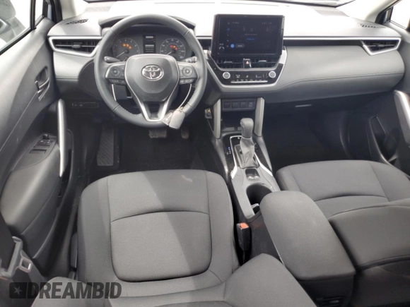 2024 Toyota Corolla Cross LE with VIN 7MUCAABGXRV118308, listed as a Copart auction lot 59959645 with 11,972 mi miles and Non repairable. Bid and sale history available at DreamBid. Image 8.