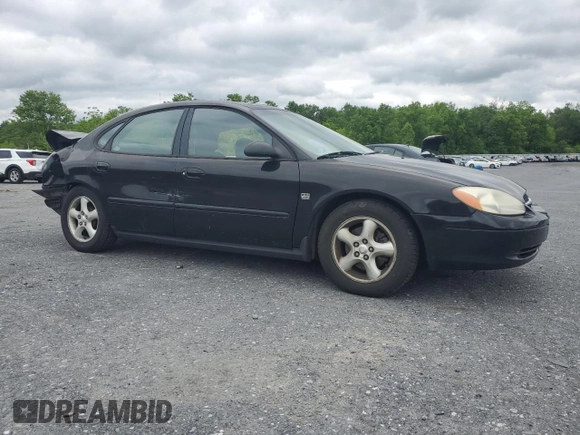 2001 Ford Taurus SEL with VIN 1FAFP56S01A258399, listed as a Copart auction lot 58963115 with 162,989 mi miles and Salvage title. Bid and sale history available at DreamBid. Image 4.