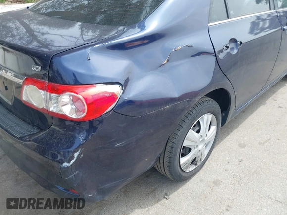 2013 Toyota Corolla L with VIN 5YFBU4EE5DP095580, listed as a IAAI auction lot 42147355 with 180,447 mi miles. Bid and sale history available at carsss.com. Image 6.