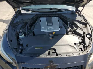 2014 Infiniti Q50 Premium with VIN JN1BV7ARXEM687605, listed as a Copart auction lot 61275535 with 104,337 mi miles and Salvage title. Bid and sale history available at DreamBid. Image 11.