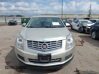 2014 Cadillac SRX Luxury Collection z VIN 3GYFNBE31ES628346, wystawiony jako IAAI lot #41709425 z przebiegiem 47 634 mil mil oraz . Historia ofert i sprzedaży dostępna na DreamBid. Obrazek 12.