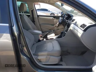 2013 Volkswagen Passat SE w/Sunroof & Nav with VIN 1VWBP7A35DC148149, listed as a IAAI auction lot 42148096 with 228,555 mi miles. Bid and sale history available at carsss.com. Image 5.