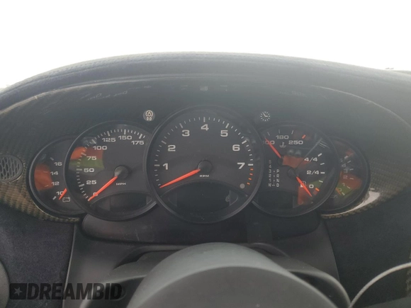 1999 Porsche 911 z VIN WP0AA299XXS623462, wystawiony jako Copart lot #85549554 z przebiegiem Nie podano mil oraz Szkoda całkowita • Salvage title. Historia ofert i sprzedaży dostępna na DreamBid. Obrazek 9.