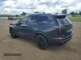 2021 Cadillac XT6 Sport with VIN 1GYKPGRS0MZ187818, listed as a Copart auction lot 66967824 with 66,956 mi miles and Salvage Title. Bid and sale history available at carsss.com. Image 2.
