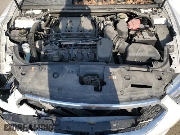 2016 Ford Taurus SEL with VIN 1FAHP2H89GG122884, listed as a Copart auction lot 53597595 with 128,627 mi miles and Salvage title. Bid and sale history available at DreamBid. Image 11.