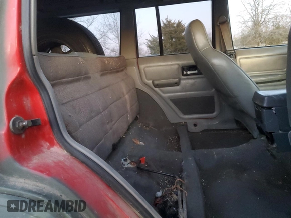 1996 Jeep Cherokee Sport with VIN 1J4FJ68SXTL316180, listed as a Copart auction lot 89080095 with 199,898 mi miles and Salvage Title. Bid and sale history available at carsss.com. Image 11.