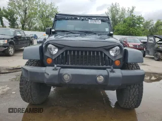 2007 Jeep Wrangler Unlimited Sahara with VIN 1J4GB59177L226122, listed as a Copart auction lot 55529575 with 208,811 mi miles and Salvage title. Bid and sale history available at DreamBid. Image 5.