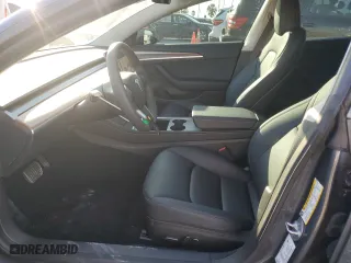 2023 Tesla Model 3 with VIN 5YJ3E1EAXPF704742, listed as a Copart auction lot 86323624 with 4,401 mi miles and Salvage Title. Bid and sale history available at carsss.com. Image 7.