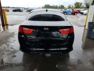 2014 Kia Optima EX z VIN 5XXGN4A79EG294524, wystawiony jako Copart lot #56227085 z przebiegiem 106 585 mil mil oraz Szkoda całkowita • Salvage title. Historia ofert i sprzedaży dostępna na DreamBid. Obrazek 6.