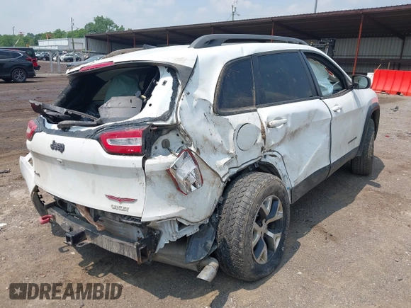 2017 Jeep Cherokee Trailhawk with VIN 1C4PJMBSXHW657446, listed as a IAAI auction lot 42406437 with 158,351 mi miles and . Bid and sale history available at DreamBid. Image 4.