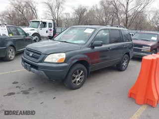 2004 Honda Pilot EX with VIN 2HKYF18644H516791, listed as a IAAI auction lot 41876348 with 291,358 mi miles. Bid and sale history available at carsss.com. Image 2.