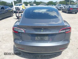 2023 Tesla Model 3 with VIN 5YJ3E1EAXPF575448, listed as a IAAI auction lot 42019288 with 33,859 mi miles and . Bid and sale history available at carsss.com. Image 17.