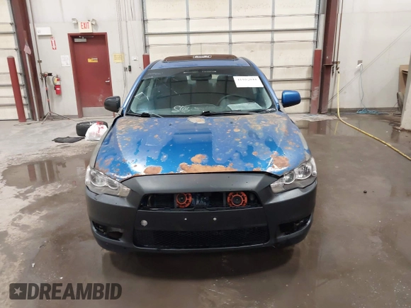 2009 Mitsubishi Lancer ES with VIN JA3AU26U29U036243, listed as a IAAI auction lot 41952044 with 181,650 mi miles. Bid and sale history available at carsss.com. Image 12.
