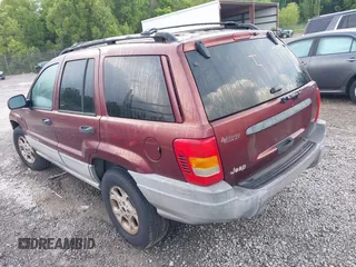 2000 Jeep Grand Cherokee Laredo with VIN 1J4G248S0YC351033, listed as a IAAI auction lot 42165830 with 145,351 mi miles and . Bid and sale history available at DreamBid. Image 3.