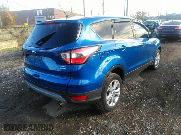 2017 Ford Escape SE with VIN 1FMCU0GD2HUE88197, listed as a IAAI auction lot 40765042 with 87,604 mi miles. Bid and sale history available at carsss.com. Image 4.